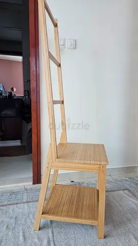 Bamboo chair and towel rack.