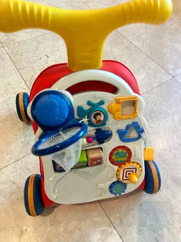 Used baby activity walker with play panel and handle