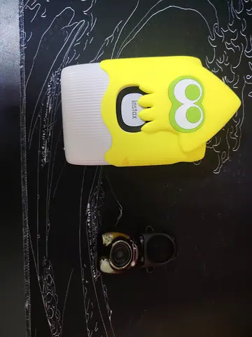Instax mini link 2 with splatoon 3 case with Instax pal fujifilm with attachment on top