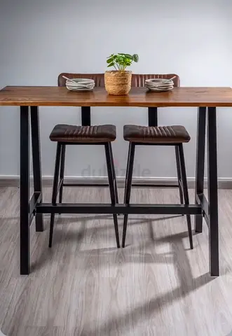 Brandnew set of long High dining table amd bar chairs from ARS CASA AE