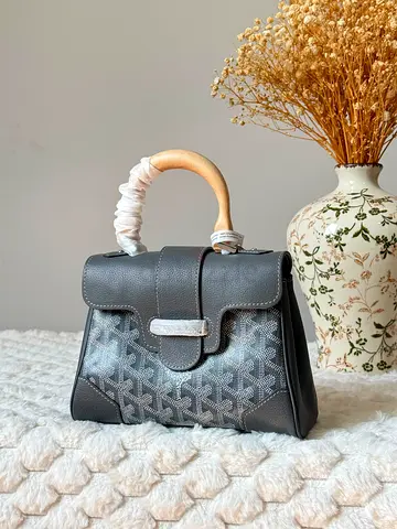 Grey patterned top-handle handbag with wooden handle - like new
