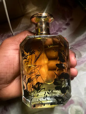 Used women's floral perfume bottle - 50ml (partially full)