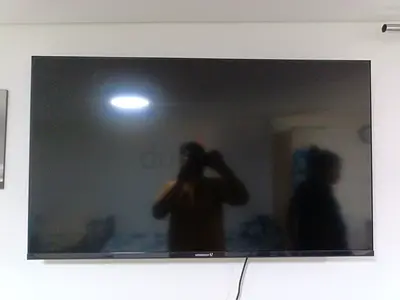Vestsen 55-inch LED Wall-Mounted TV - Good Condition