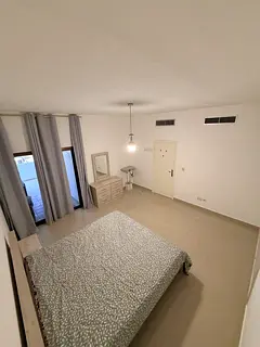 Large Private Bedroom & attached sunny Balcony | 2BR Apt | 4 min beach | vast parking & market 24/7