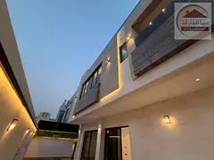 Super deluxe luxury villa for sale in Al-Houshi, corner on two streets with a modern design, availab