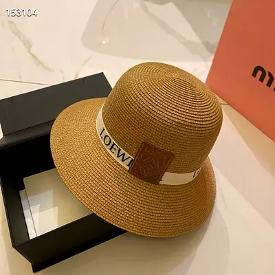 Loewe style woven straw sun hat with ribbon logo