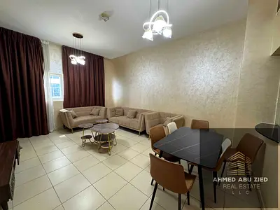 The most beautiful and elegant two-bedroom apartment with a living room, fully furnished, for annual rent at Ajman One Towers.