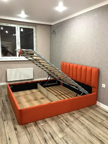 Orange upholstered storage bed with lift-up frame - Queen size