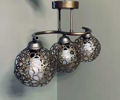 Three-Globe Decorative Ceiling Light - Ornate Metal Design