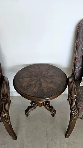 Round wooden side table with carved legs - classic design plus two chairs