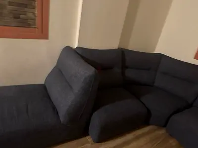 Dark grey L-shaped modular sofa, good condition
