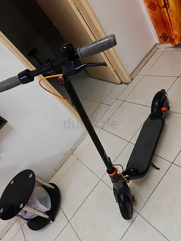 Ninebot Electric Scooter Black with Orange Accents battery 🔋 Rang 25km location Sharjah