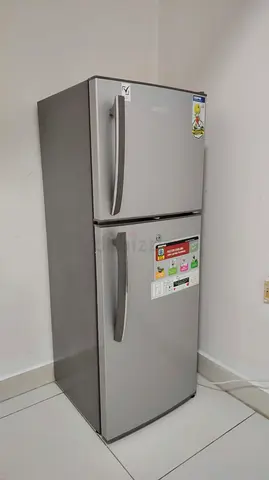 Silver double-door refrigerator, good working condition
