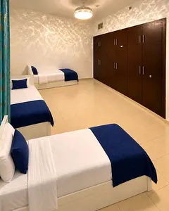 A master bedroom with attached washroom and private balcony available in Barsha Hights Tecom