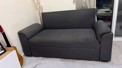 Dark grey 3-seater sofa bed in good condition