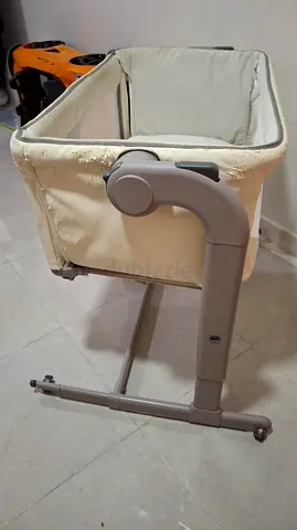 Used bedside bassinet / crib - beige, sturdy frame