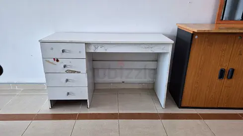 White wooden study desk with four drawers - used