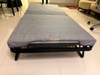 Foldable single guest bed / rollaway bed with mattress - good condition