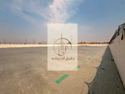 Industrial land for rent in Al Sajaa | 110,000 sq. ft. | Near Emirates Road | Strategic location