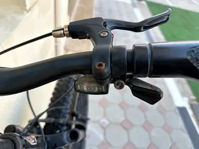 Used mountain bike - needs minor adjustments, working gears and brakes