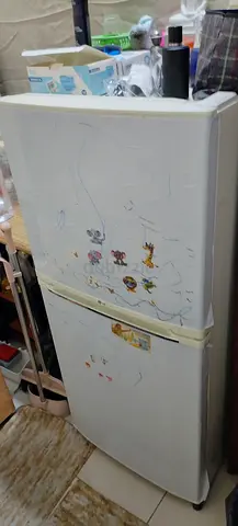 Used small double-door refrigerator - good working condition