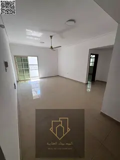 Spacious one-bedroom apartment with a living room, open view, balcony, and central air conditioning.