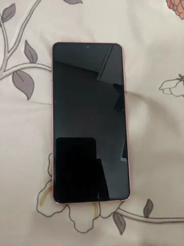 Used pink smartphone in good working condition - unlocked