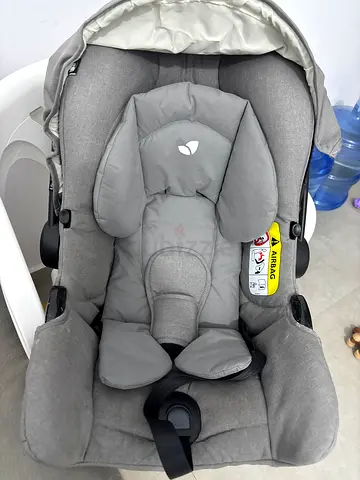 Light grey infant car seat (rear-facing) - good used condition