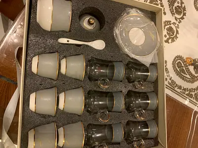 Porcelain tea/coffee cup set with saucers and spoons - unused