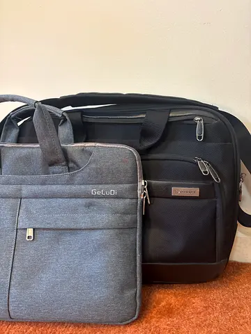 OFFER TWO LAPTOP BAGS.GeLuDi Grey Normal size and emient Black big size bag