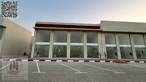 For sale in Al Helio: Freehold building consisting of commercial shops; electricity and water included.
