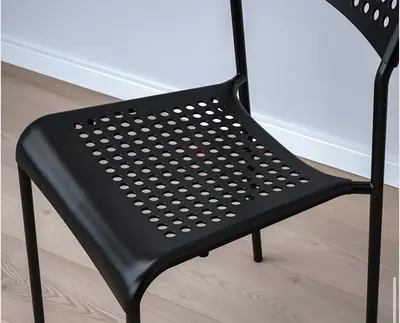 Set of 2 Black Plastic Perforated Dining Chairs - Modern, Stackable