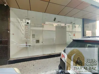 Shop for annual rent in Al Majaz 1 | Corner unit facing the street | Ready for immediate operation