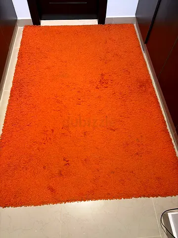 Bright Orange Shaggy Rug - 50 AED