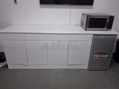 White sideboard cabinet with storage - good condition