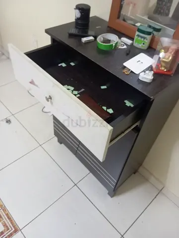 Small two-drawer bedside cabinet / dresser - dark wood with white drawer