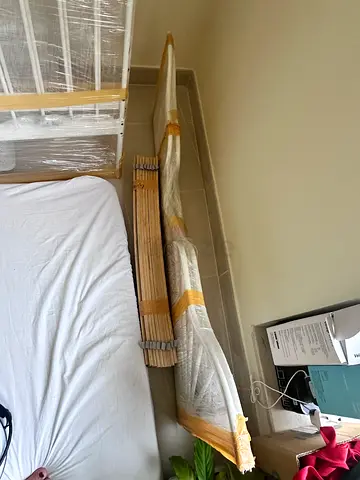 Large rolled area rug - unused, wrapped for transport