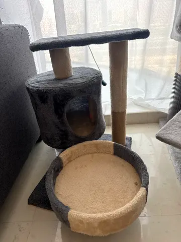 Used multi-level cat tree with condo, scratching posts and round bed