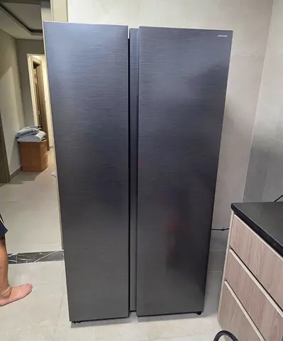 Samsung side by side refrigerator new model same like a new condition