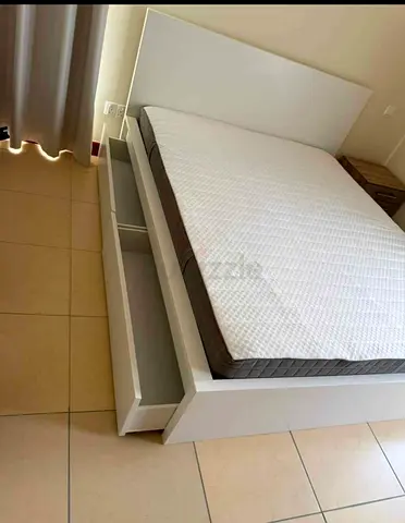 IKEA Brand brimnes king size bed with 2 Big storage drawers and 2 new mattress neat and clean