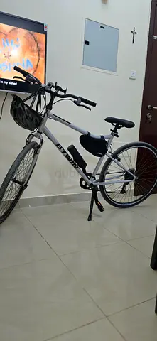 Used B'Twin Hybrid City Bike - Comfortable Commuter, Good Condition