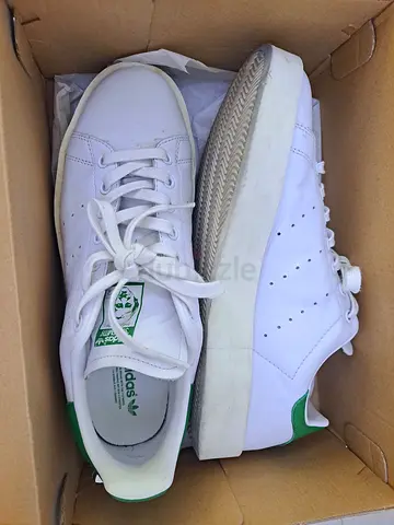 White Adidas Stan Smith sneakers, size unknown, gently used 10.5 or 11 fits good