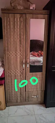 Wooden two-door wardrobe with mirror and drawer - good condition