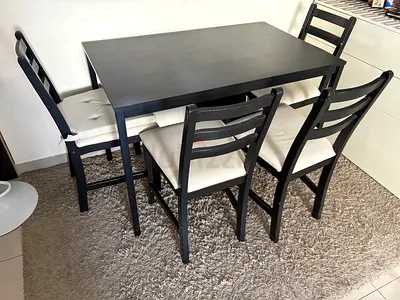 IKEA Black Wood 4-Seater Dining Table with Cushioned Chairs