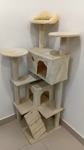 Used beige multi-level cat tree with condo and scratching posts