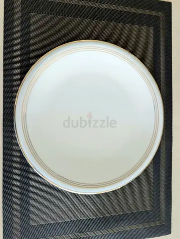 Set of white dinner plates with gold rim (single shown) - good condition