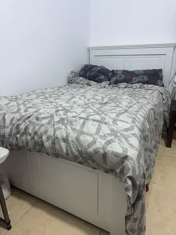 White wooden double bed frame with headboard - good condition