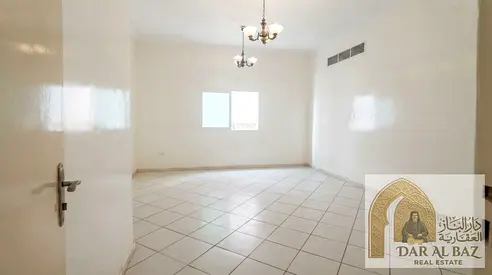 2 Bedrooms And Hall For Annual Rent In Sharjah | Open View With Balcony | Central AC | Spacious | Free Maintenance | Wall Cabinets