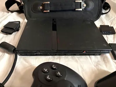 Sony PlayStation 2 Slim with Controller, Memory Cards and Accessories