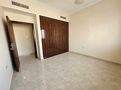 Luxury 2bhk Like Brand new Family building 48k rent wardrobe 2 Bath Prime location Near claro coffee Al zahia 1 Area